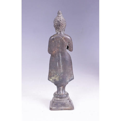 399 - A selection of South East Asian objet d'art, 20th century, to include a small bronze figure of conte... 