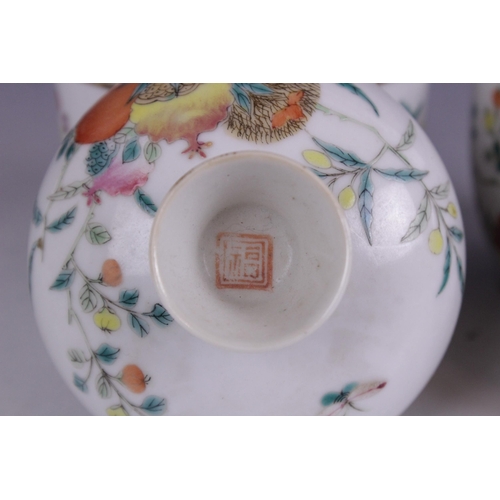 407 - A pair of Chinese porcelain cups and covers, Republic Period, each of cylindrical form and painted w... 