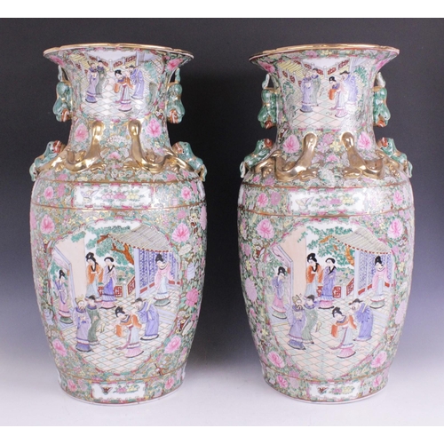 409 - A pair of Chinese Canton famille rose altar vases of large proportions, 20th century, the bodies and... 