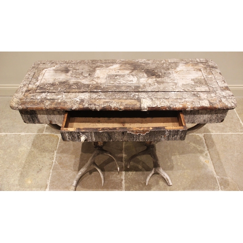 789 - A 19th century antler console table, the rectangular pine table top overlaid with antler bark, and c... 