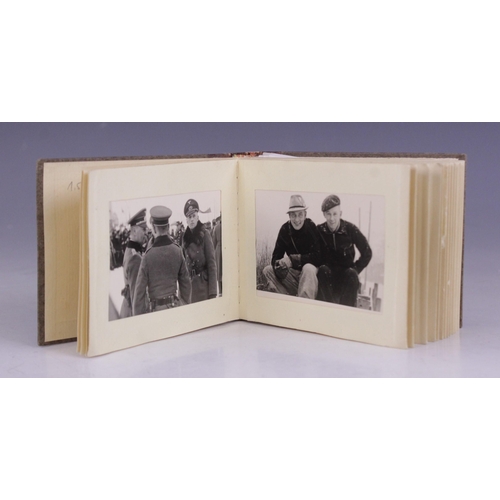 193 - WORLD WAR II INTEREST: A WWII German photograph album containing thirty seven 6cm x 9cm monochrome p... 