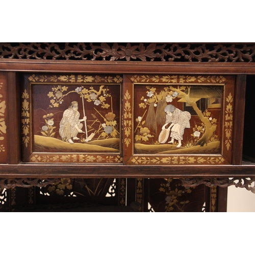 429 - A Japanese shibayama cabinet, early 20th century, with an open work foliate gallery above a conformi... 