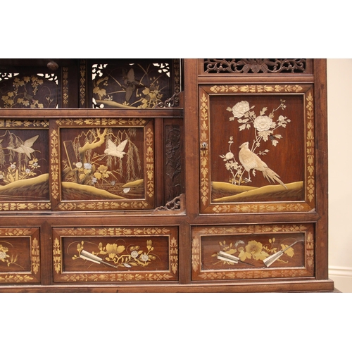 429 - A Japanese shibayama cabinet, early 20th century, with an open work foliate gallery above a conformi... 