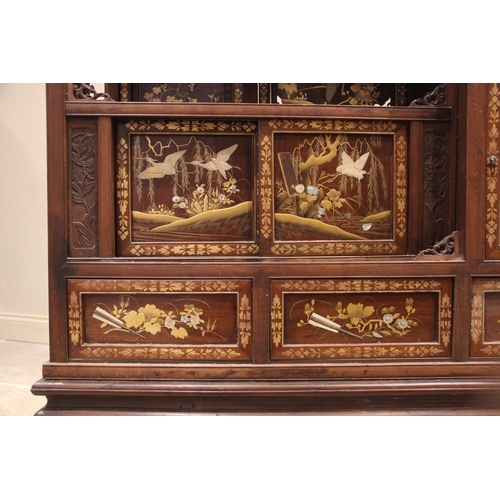 429 - A Japanese shibayama cabinet, early 20th century, with an open work foliate gallery above a conformi... 