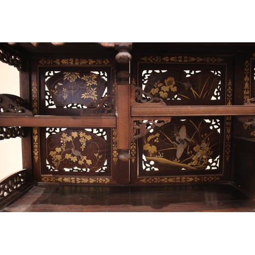 429 - A Japanese shibayama cabinet, early 20th century, with an open work foliate gallery above a conformi... 