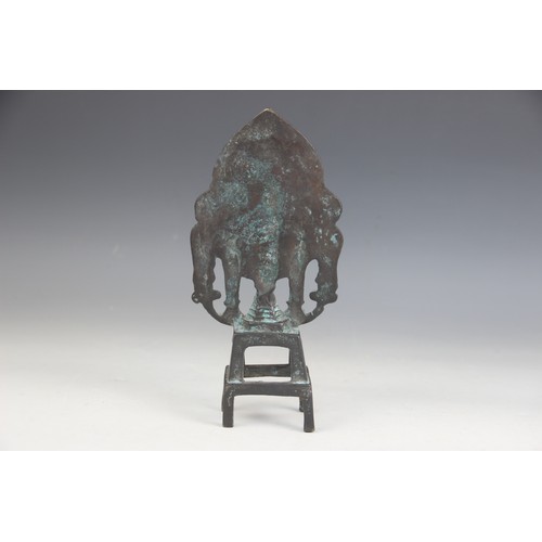 399 - A selection of South East Asian objet d'art, 20th century, to include a small bronze figure of conte... 