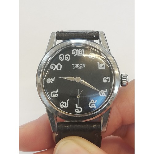 74 - A Tudor Oyster wristwatch, the circular black dial with Thai numerals and subsidiary seconds dial to... 