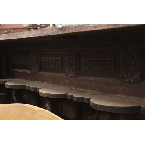 792 - A substantial 19th century carved oak sideboard back, profusely carved with flowerhead and geometric... 