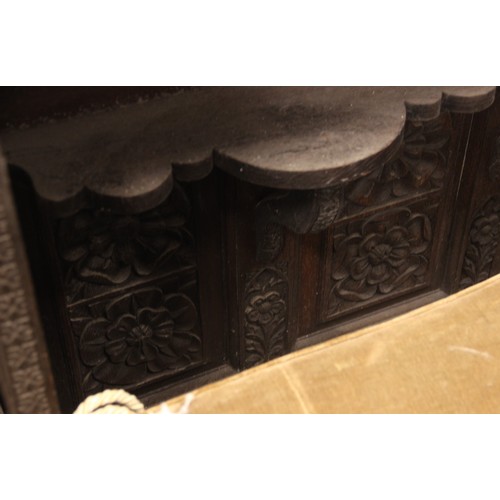 792 - A substantial 19th century carved oak sideboard back, profusely carved with flowerhead and geometric... 