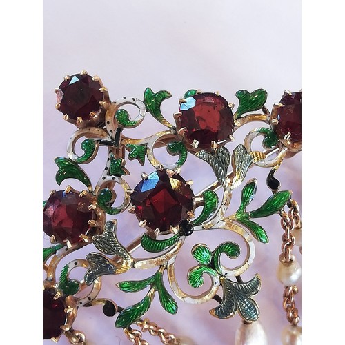 126 - A 19th century garnet, pearl and enamel brooch pendant, in the manner of Carlo Giuliano, the scrolli... 