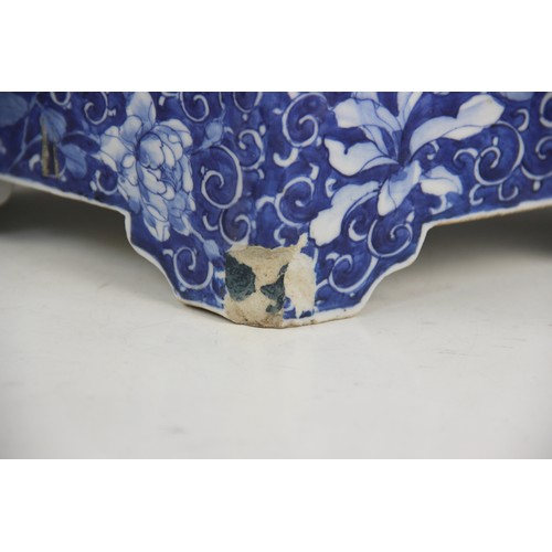 436 - A Japanese Arita porcelain stick stand, Meiji period (1868-1912), decorated in a blue and white pale... 