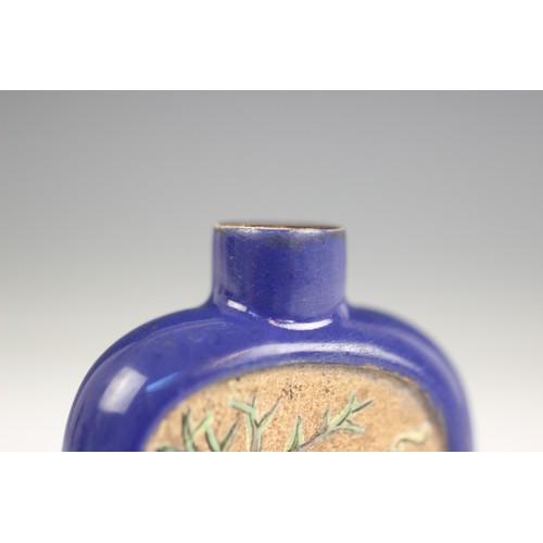 421 - A Chinese blue-ground Yixing stoneware snuff bottle, 19th century, decorated with two reserves depic... 