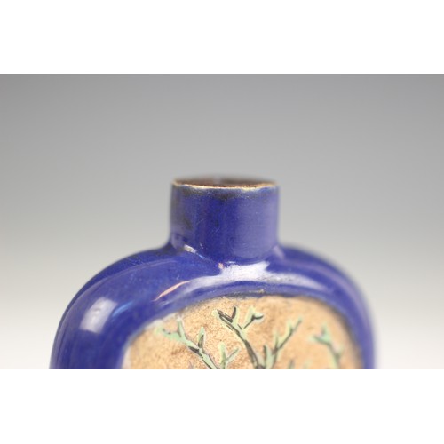 421 - A Chinese blue-ground Yixing stoneware snuff bottle, 19th century, decorated with two reserves depic... 