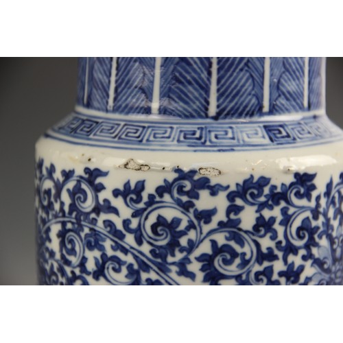 412 - A large Chinese porcelain blue and white Gu vase, 18th/19th century, decorated with formal scrolling... 