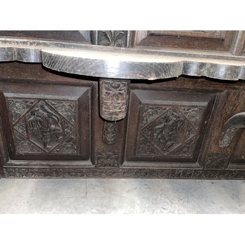 792 - A substantial 19th century carved oak sideboard back, profusely carved with flowerhead and geometric... 