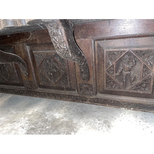 792 - A substantial 19th century carved oak sideboard back, profusely carved with flowerhead and geometric... 