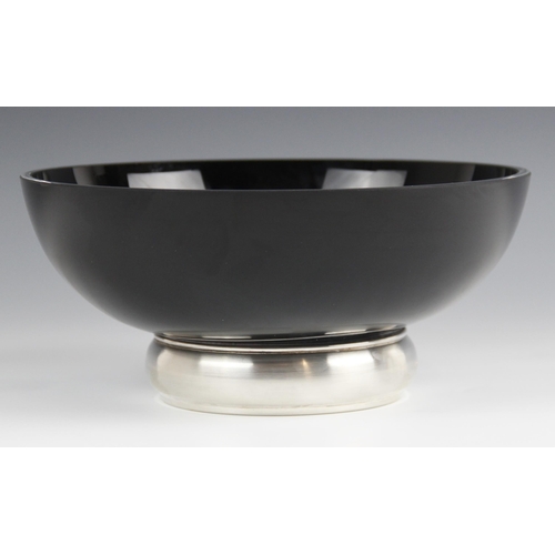 107 - A black glass silver mounted presentation bowl, Broadway & Co, Birmingham 2008, of circular form on ... 