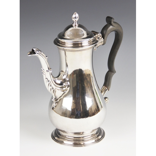 108 - A George III silver coffee pot, London 1764 (maker's marks worn), of baluster form on raised foot, c... 