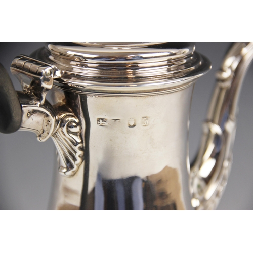 108 - A George III silver coffee pot, London 1764 (maker's marks worn), of baluster form on raised foot, c... 