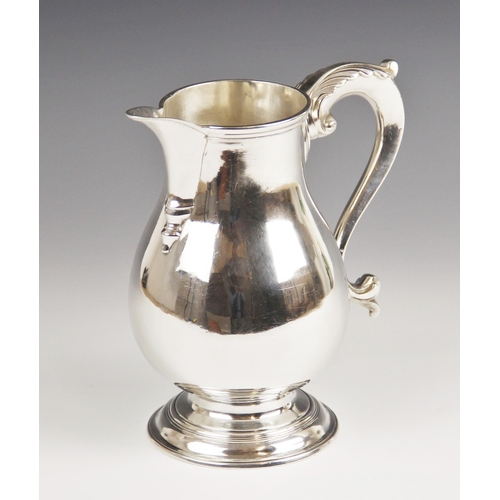 109 - George II silver beer jug, William Cripps, London 1759, of baluster form upon circular foot, acanthu... 