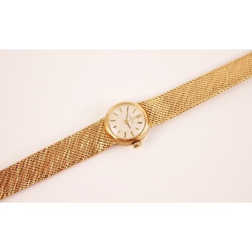 119 - A lady's Omega 9ct gold wristwatch, the round pearlescent dial with baton markers, set to a circular... 