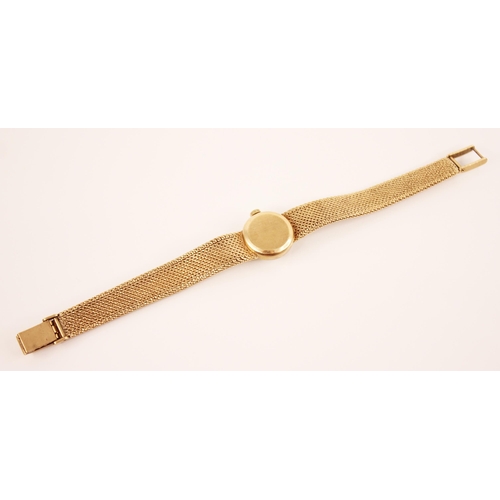 119 - A lady's Omega 9ct gold wristwatch, the round pearlescent dial with baton markers, set to a circular... 