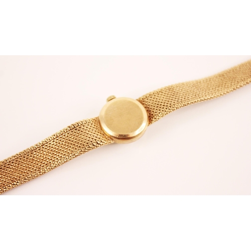 119 - A lady's Omega 9ct gold wristwatch, the round pearlescent dial with baton markers, set to a circular... 