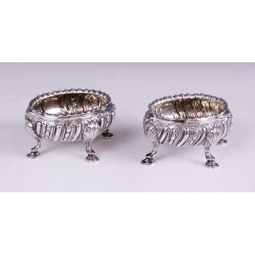 12 - A matched pair of Victorian silver salts, one marked for Daniel & Charles Houle, London 1857, the ot... 
