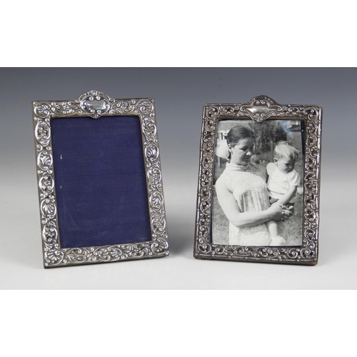 14 - A Victorian silver mounted photograph frame, Henry Matthews, Birmingham 1899, of rectangular form, e... 