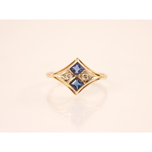 157 - A continental 14ct gold diamond and blue gemstone set ring, the white metal diamond shaped head set ... 