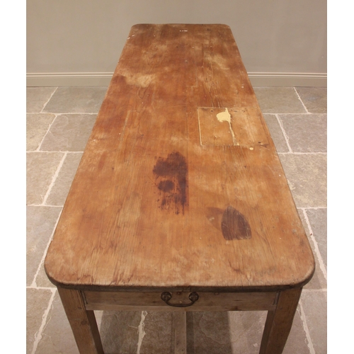 753 - A 19th century pine country house kitchen or scullery table, the rectangular scrub top with rounded ... 