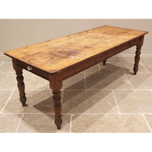 760 - A Victorian style pine kitchen table, late 20th century, the rectangular plank top with rounded corn... 