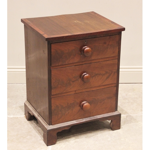 766 - A mid 19th century mahogany chest, of small proportions, the rectangular crossbanded top above three... 