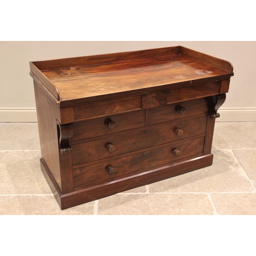 780 - A mid 19th century mahogany tray top chest, the rectangular top with a three quarter gallery over a ... 