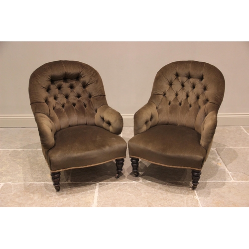 781 - A pair of Victorian tub type chairs, upholstered in green velour fabric, each with an arched button ... 