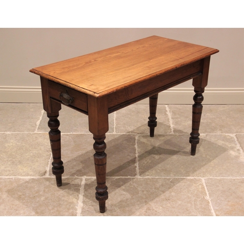 785 - A Victorian pitch pine side table, the rectangular moulded top above a pair of opposing frieze drawe... 