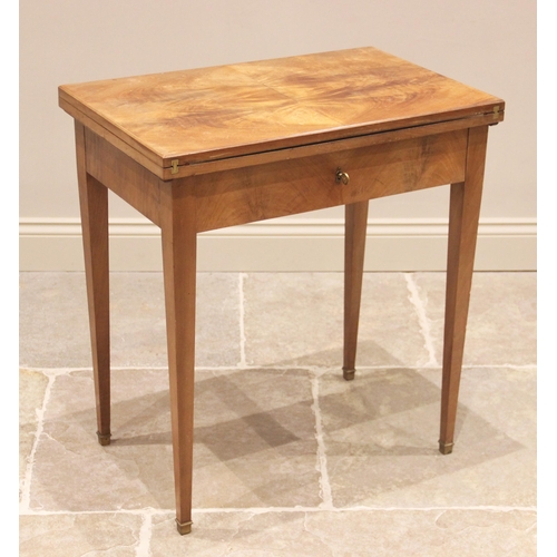 808 - An early 20th century walnut game/writing table by John Bagshaw, Liverpool, the quarter veneered top... 