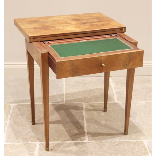 808 - An early 20th century walnut game/writing table by John Bagshaw, Liverpool, the quarter veneered top... 