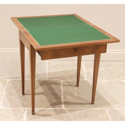 808 - An early 20th century walnut game/writing table by John Bagshaw, Liverpool, the quarter veneered top... 