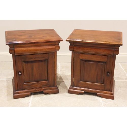 815 - A pair of contemporary hardwood bedside chests, each with a cushion shaped frieze drawer over a sing... 