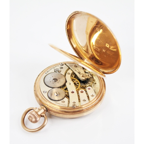 139 - A 9ct full hunter pocket watch, Birmingham 1924, manual wind, the cover revealing a white enamel dia... 