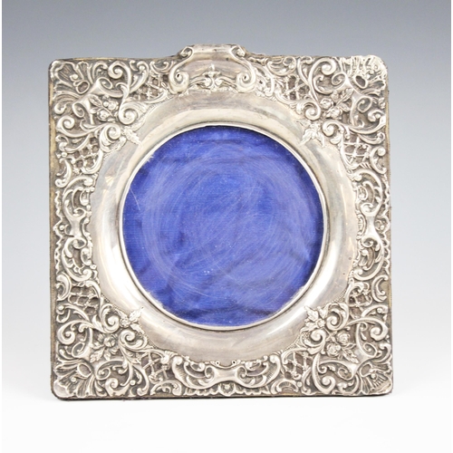 1 - An Edwardian silver mounted photograph frame, Henry Matthews, Birmingham 1901, of square form with e... 