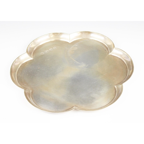 2 - A silver tray, Lowe & Sons, Chester 1962, of plain polished hexafoil form, 25.3cm diameter, weight 2... 