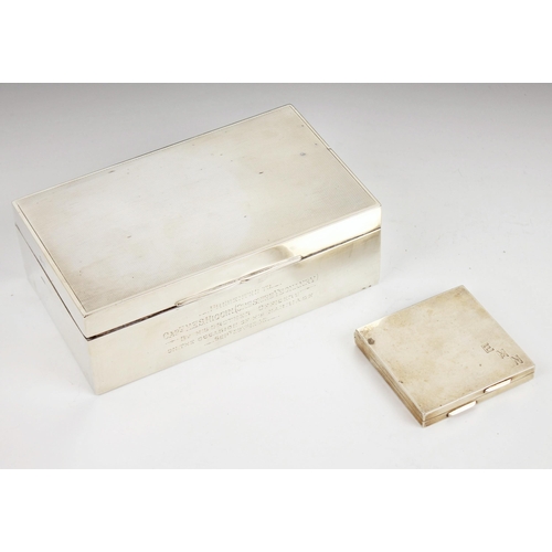 29 - A George VI silver mounted cigarette box, F H Adams & Holman, Birmingham 1948, of rectangular form w... 