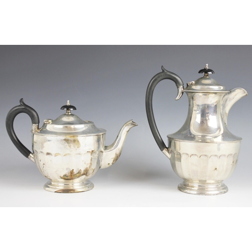 78 - A George V silver teapot and hot water jug, Emile Viner, Sheffield 1933/34, each with half-fluted bo... 