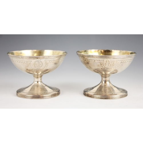 82 - A pair of George III silver salts, probably Joseph Scammell, London 1791, each of circular pedestal ... 