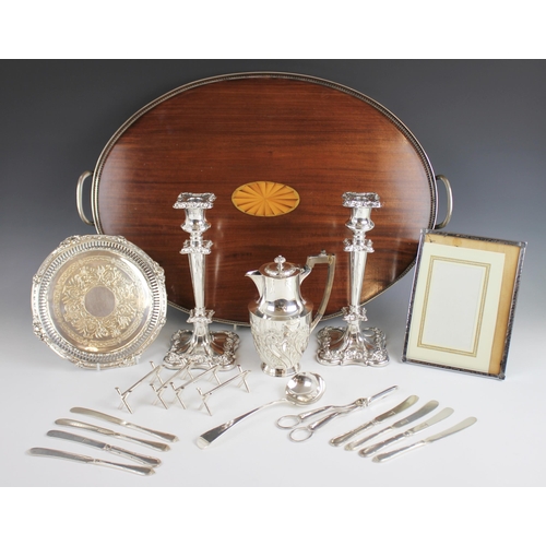 115 - A selection of silver plated and silver coloured wares, to include a pewter frame, stamped 'Moseley ... 