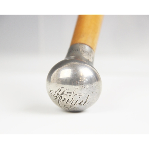 20 - A silver mounted presentation conductor's baton, John Grinsell & Sons, Birmingham 1887, the silver t... 