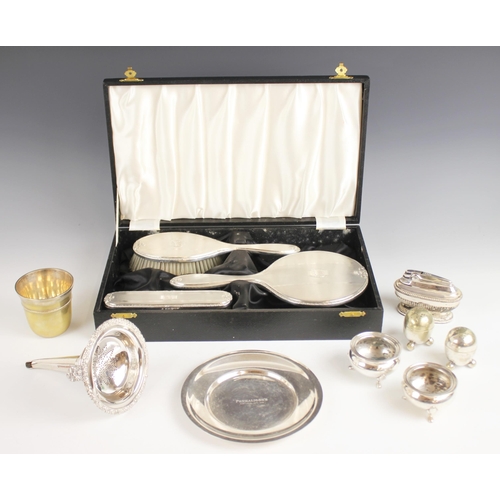 30 - A cased silver mounted dressing table set, Adie Brothers, Birmingham 1962, comprising mirror, hairbr... 
