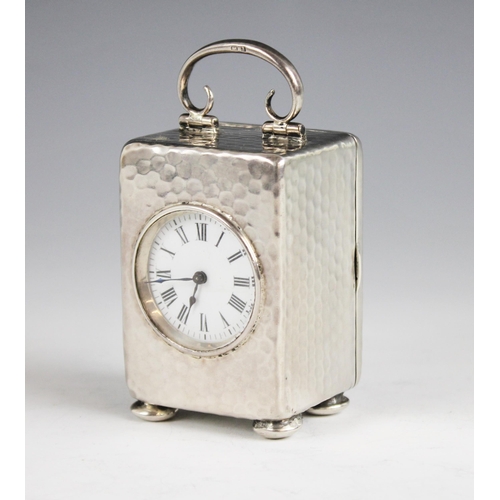 64 - A late Victorian miniature silver travelling clock, Henry Matthews, Birmingham 1900, the circular wh... 